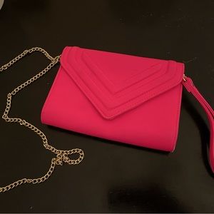 Fuchsia clutch purse from Aldo